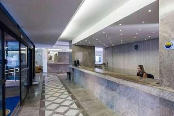 Apto Aconchegante: Beachfront Comfort with BBQ & Daily Cleaning Guaruja Exterior photo