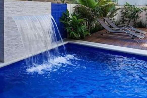 Apto Aconchegante: Beachfront Comfort with BBQ & Daily Cleaning Guaruja Exterior photo