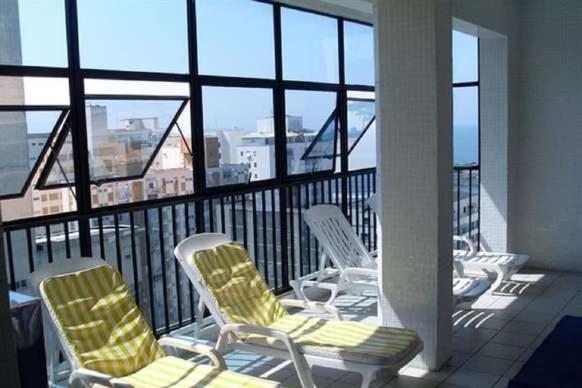 Apto Aconchegante: Beachfront Comfort with BBQ & Daily Cleaning Guaruja Exterior photo